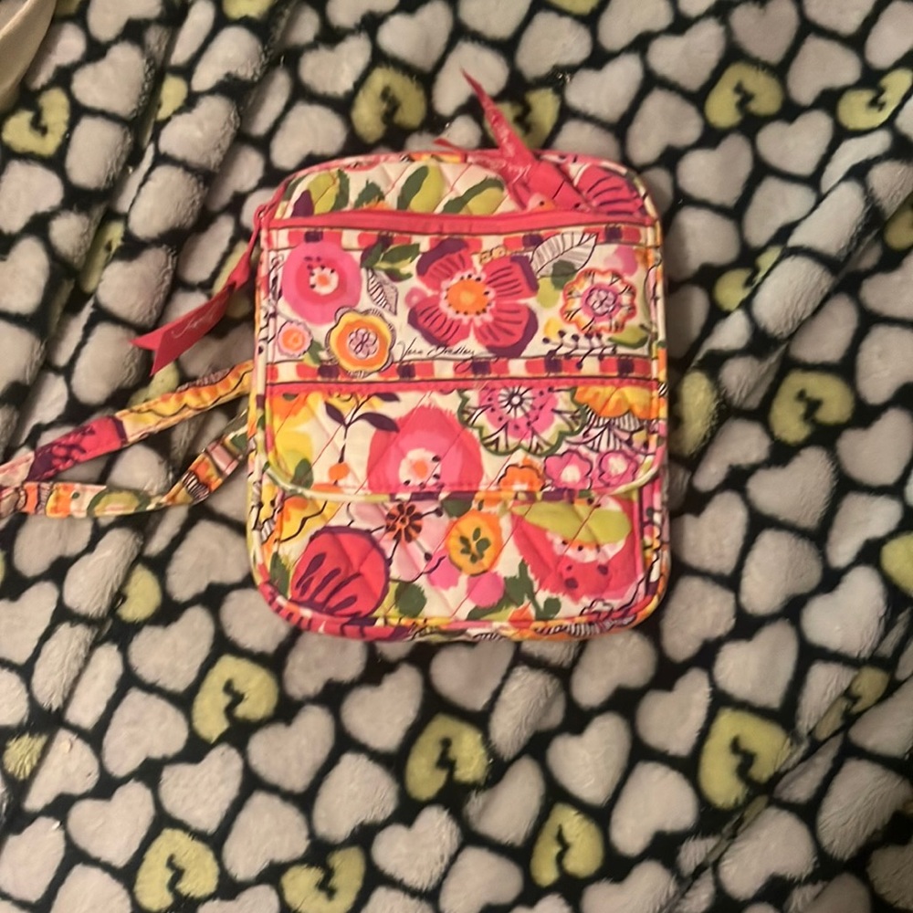 Vera Bradley mini purse. Adjustable strap.